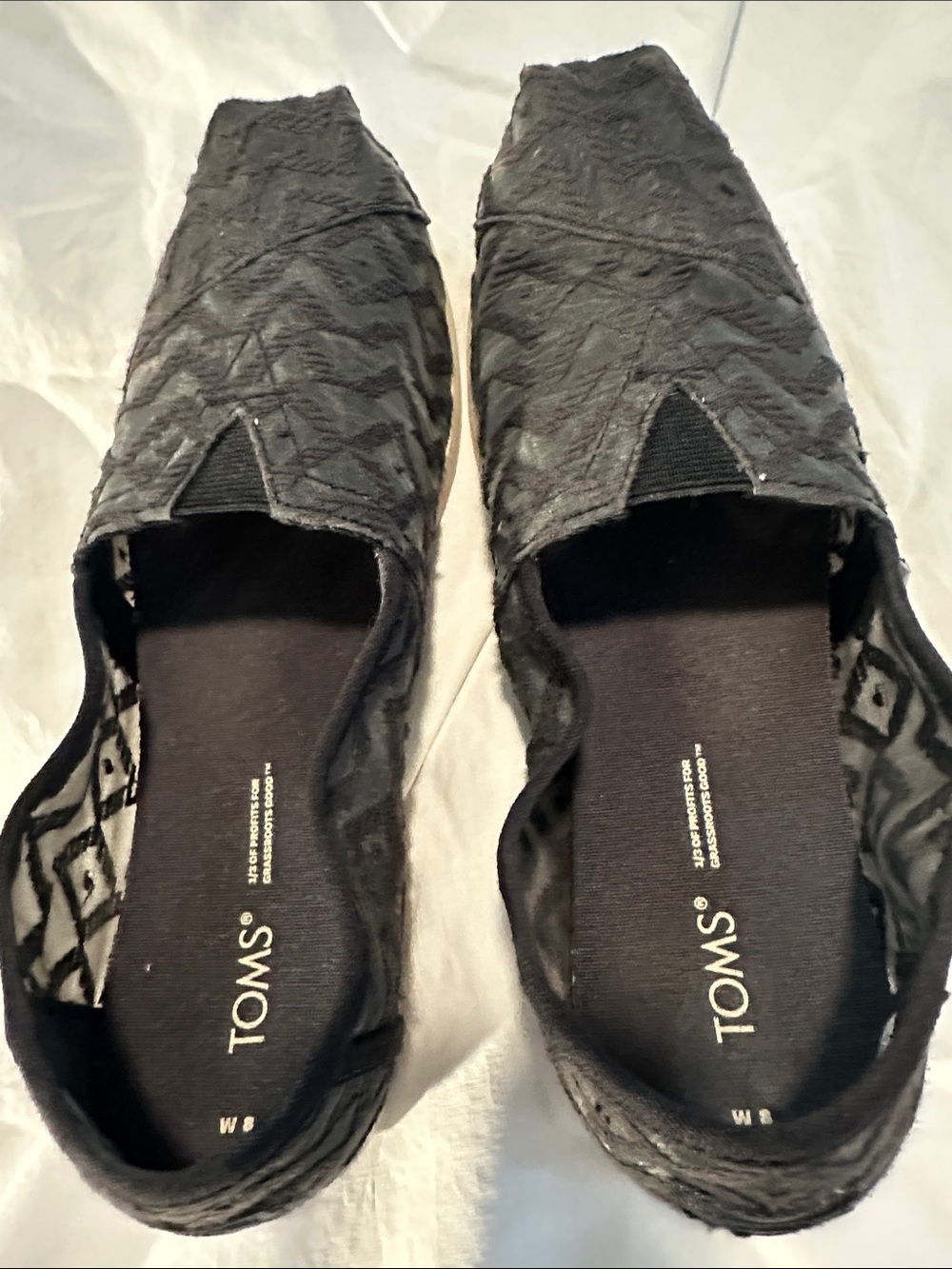 TOMS Women's Black Textured Slip-On Moccasins